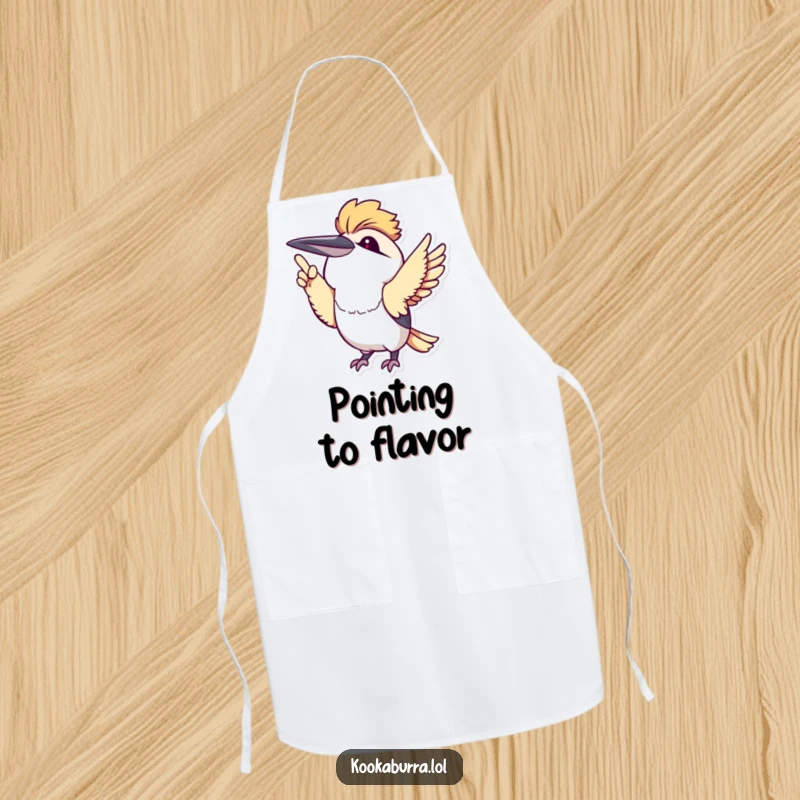 Cute kawaii kookaburra pointing upwards with its wing, featured on a kitchen apron, adding cute humor to cooking.