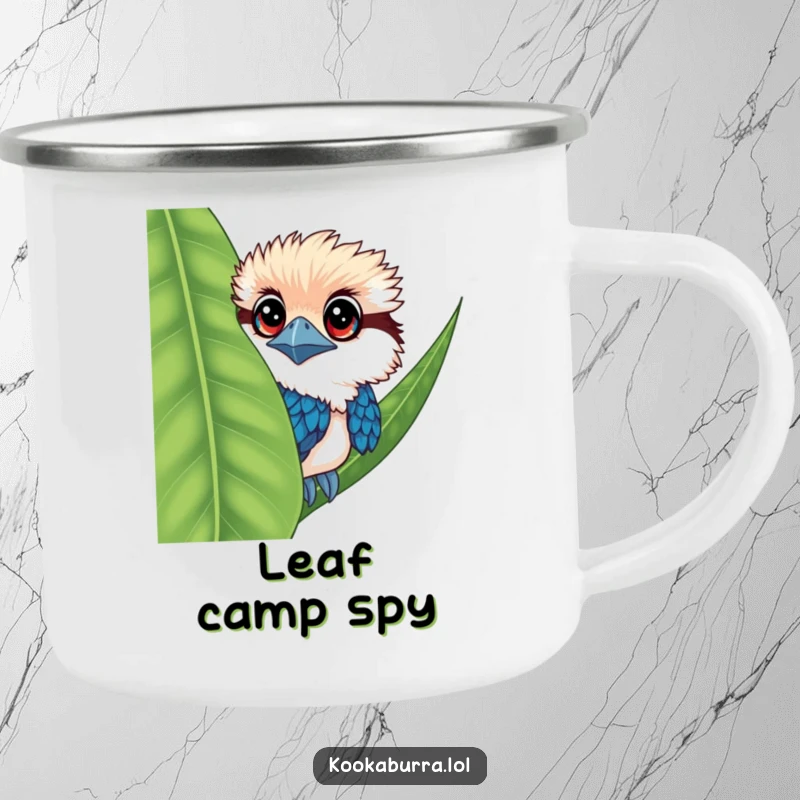 Funny kookaburra camping mug with a bird having big eyes, peeking from behind a leaf.