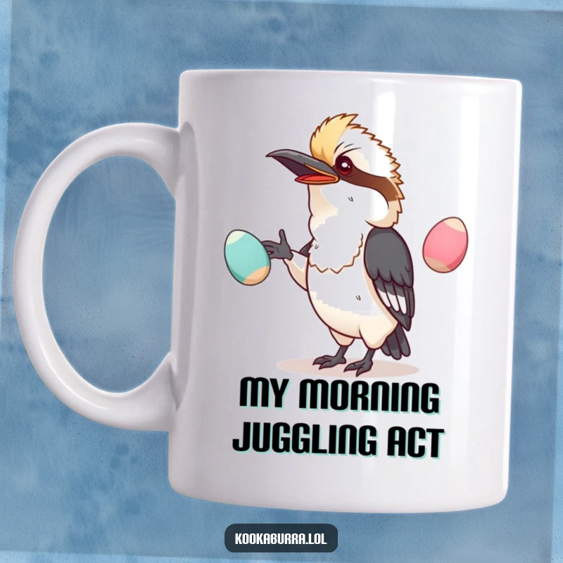 Funny mug featuring a kawaii kookaburra hilariously juggling oversized, wobbly eggs with a determined yet comical expression.