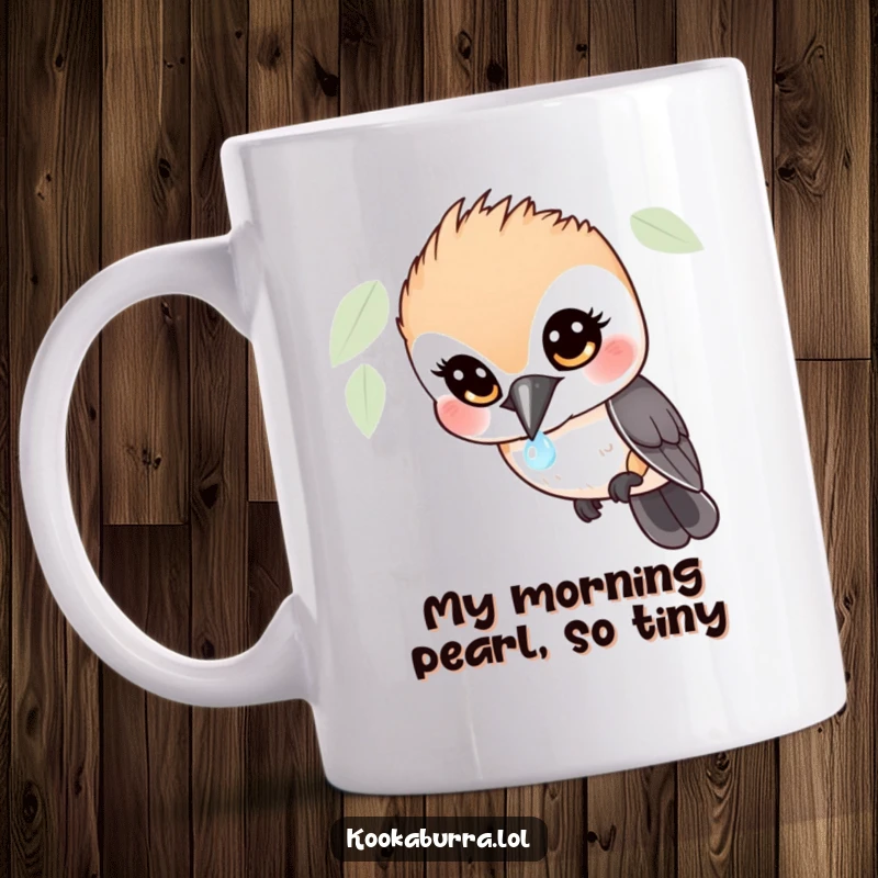 Funny Kookaburra Mug: Wide-eyed bird mesmerized by a sparkling dewdrop, capturing a moment of pure, hilarious fascination.