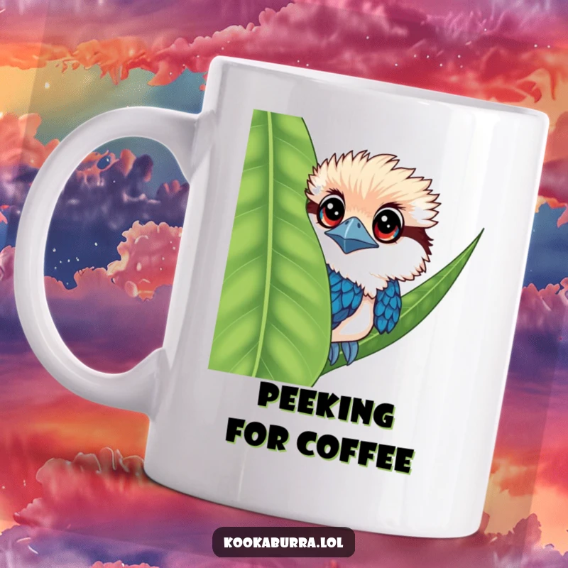 Funny kookaburra mug with huge eyes, playfully peeking from behind a lush green leaf.