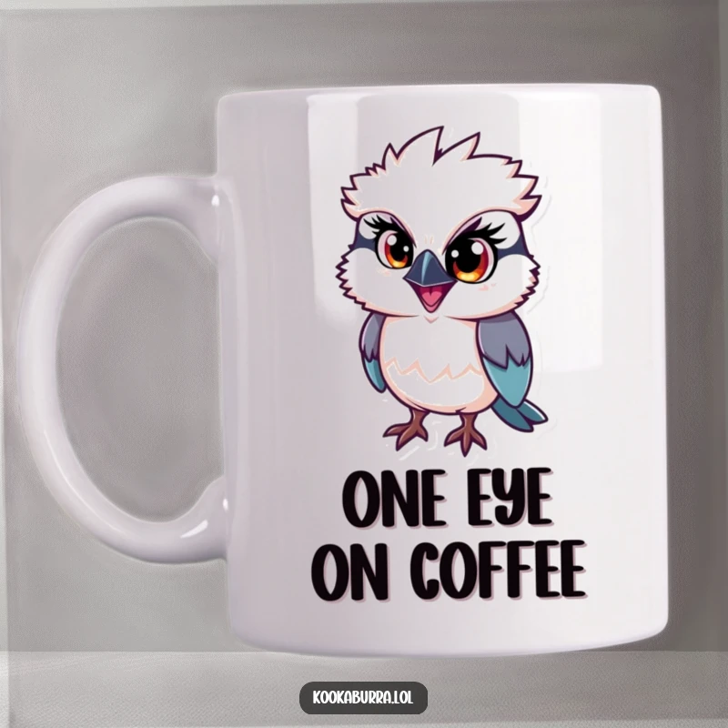 Funny kookaburra mug, a bird with one large sparkling eye full of mischief and playful intent.