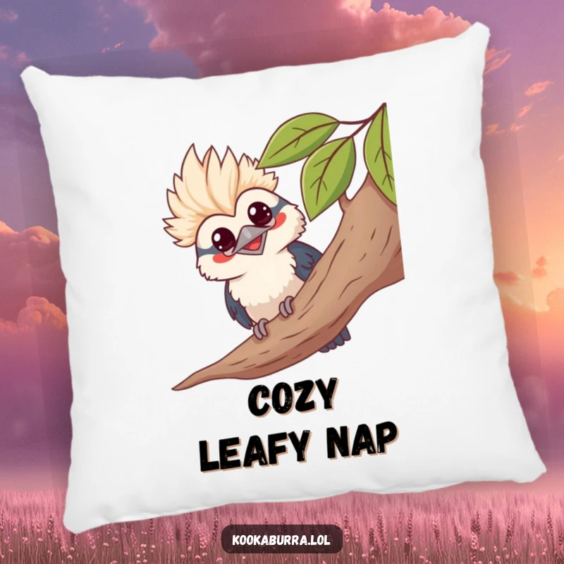 Funny kawaii kookaburra pillow, peeking from leaves, grinning, cute bird cushion, soft and humorous decor.