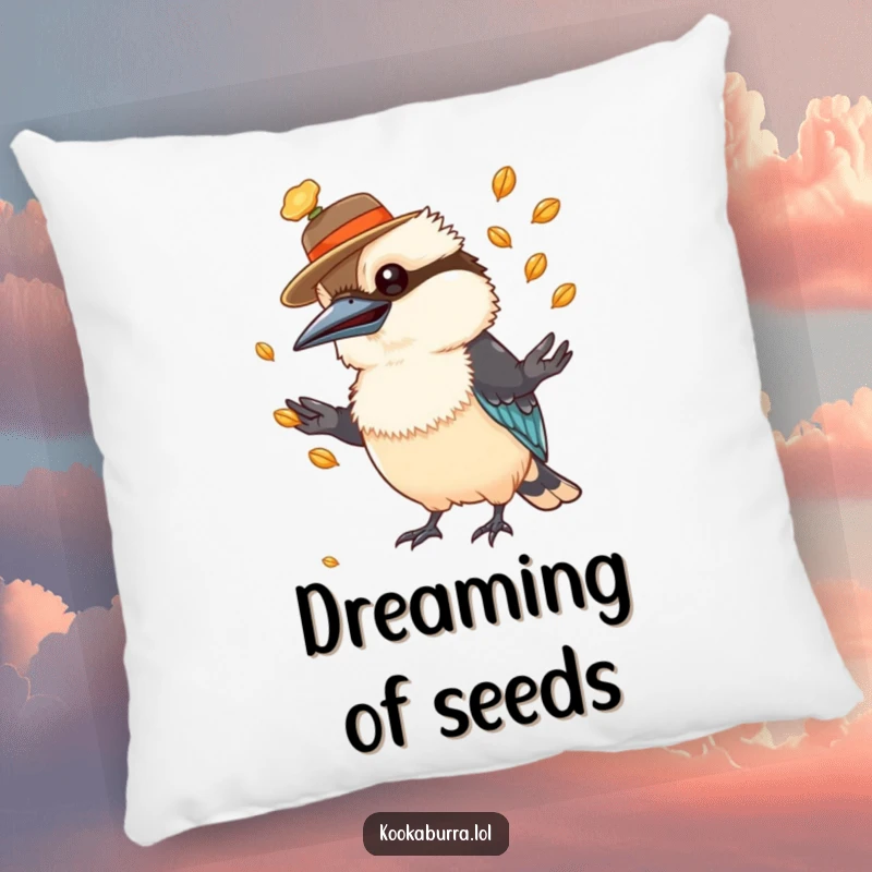 Funny kookaburra pillow showcasing a bird in a hat, juggling shiny seeds, soft and humorous.