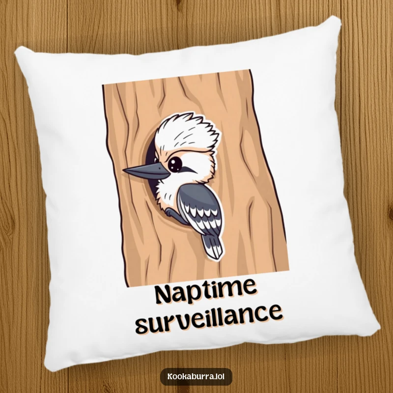 Funny kookaburra pillow, a cute bird peeking playfully from a tree, adding cozy humor and whimsical charm to any room.