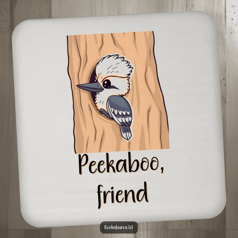 Funny kookaburra coaster, a cute bird peeking from a tree, protecting surfaces with playful and humorous charm.
