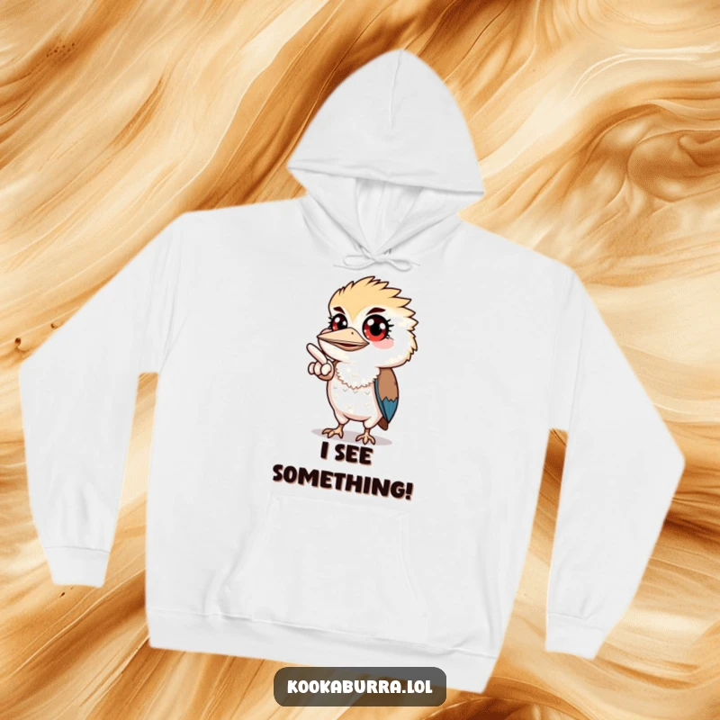 Funny hoodie featuring a kookaburra with wide eyes, pointing off-screen, creating a sense of playful intrigue and warmth.