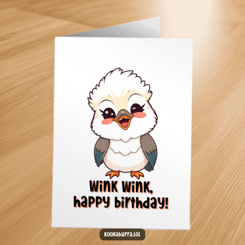 Funny Free Printable Birthday Card featuring a kawaii kookaburra with a playful wink and a huge beaming smile, perfect for a joyful birthday wish.