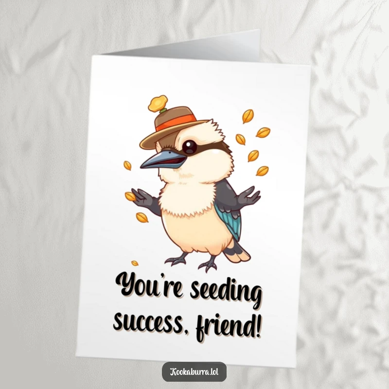 Funny Free Printable Kookaburra Congratulations Card: A kookaburra in a tiny hat juggles seeds, celebrating your success with a cheerful expression.