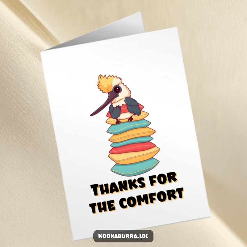 Funny free printable thank you card featuring a whimsical kookaburra balancing a stack of colorful pillows, conveying thanks with charm.