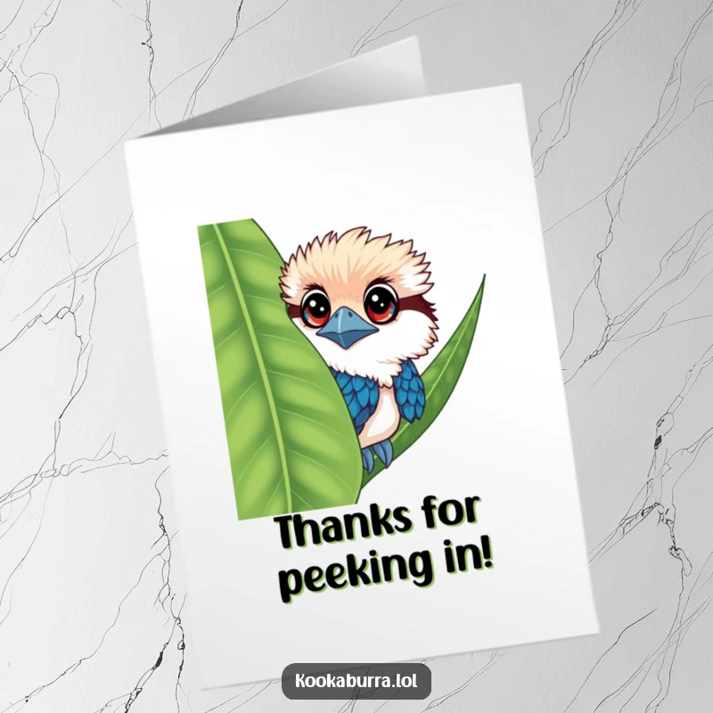Funny Free Printable Kookaburra Thank You Card: A kookaburra with big eyes peeks from behind a leaf, offering a sweet, funny thank you.