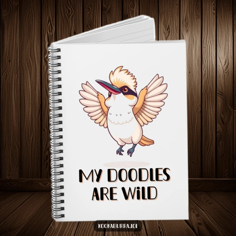 Funny notebook with a kookaburra doing a comical dance, wings spread wide, perfect for jotting down happy thoughts.