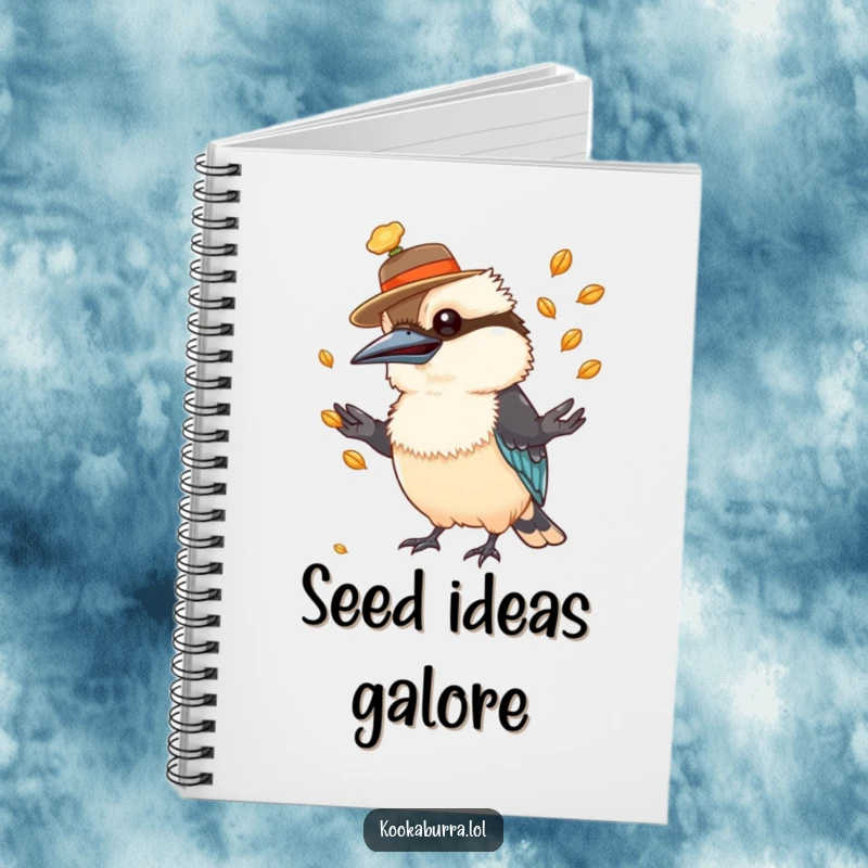 Funny kookaburra notebook cover showing a bird in a hat, juggling seeds, perfect for creative minds.