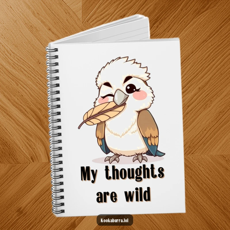 Funny kawaii kookaburra notebook featuring a winking bird with a feather comically stuck on its beak, ideal for humorous note-taking.