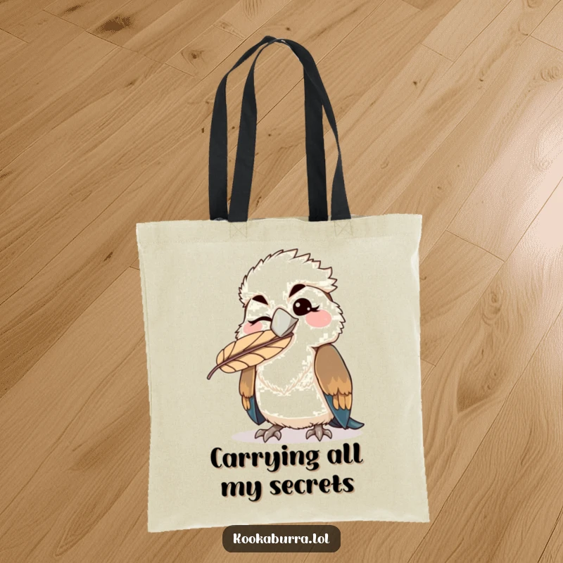 Funny kawaii kookaburra tote bag depicting a winking bird with a feather stuck on its beak, a comical and practical accessory.
