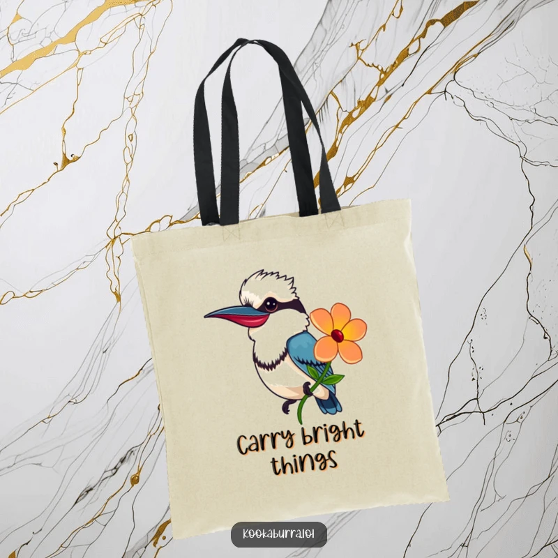 Funny Tote Bag showing a smiling kookaburra offering a colorful flower, perfect for carrying essentials with a kind spirit.