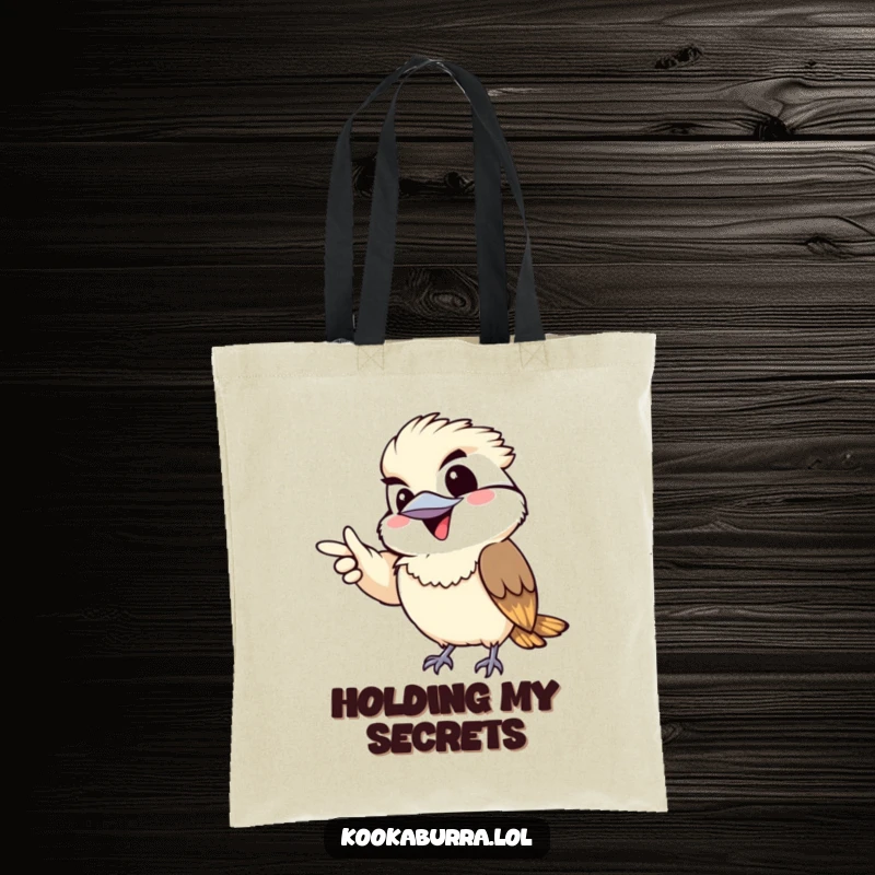 Funny tote bag featuring a kawaii kookaburra gleefully pointing with a mischievous grin, radiating playful intent.