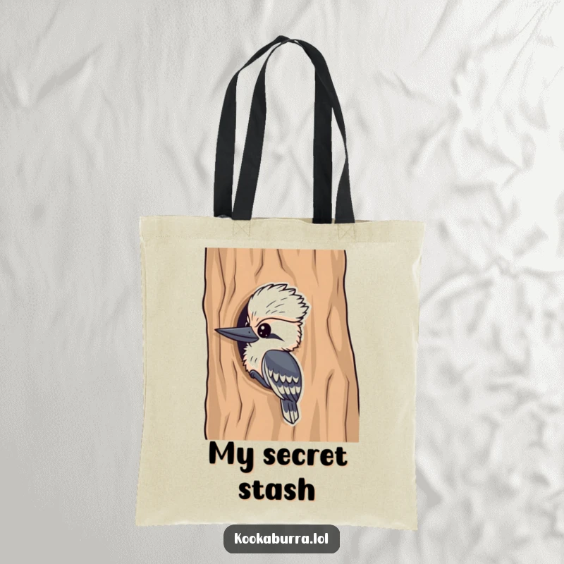 Funny kookaburra tote bag, a cute bird peeking from behind a tree, showcasing playful and charming humor.